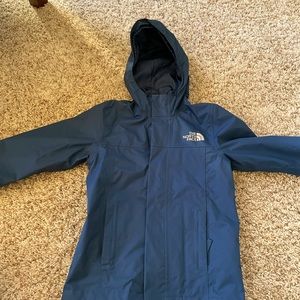 Boys size extra small north face rain coat. In excellent condition.